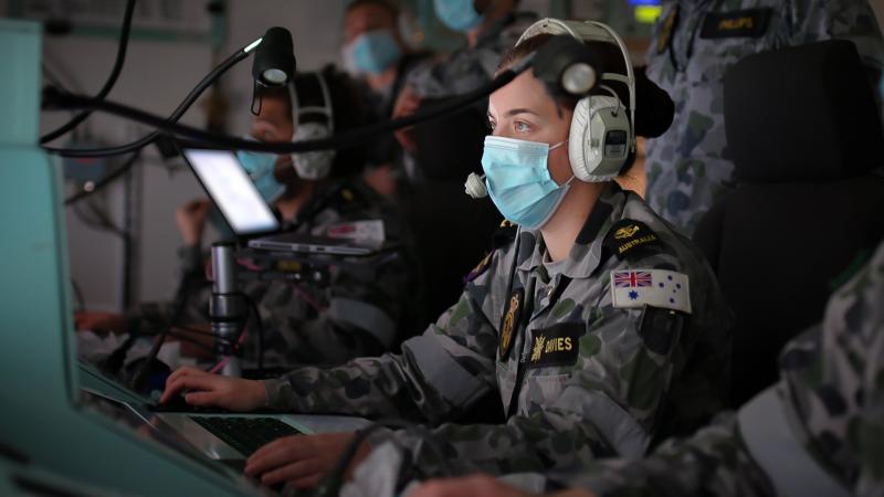HMAS Anzac sailor Leading Seaman Combat Systems Operator Rebecca Davies monitors her console in the operations room of the frigate simulator at the Naval Engineering Support Centre at HMAS Stirling. Photo: Leading Seaman Ronnie Baltoft