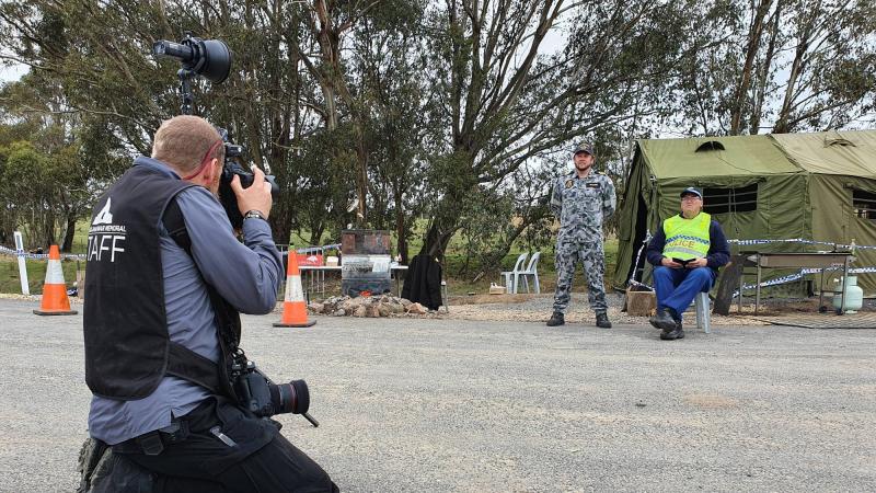 Australian War Memorial commissioned photographer Gary Ramage photographs Lieutenant Jay Sumner with NSW Police Force Acting Sergeant David Adams. 