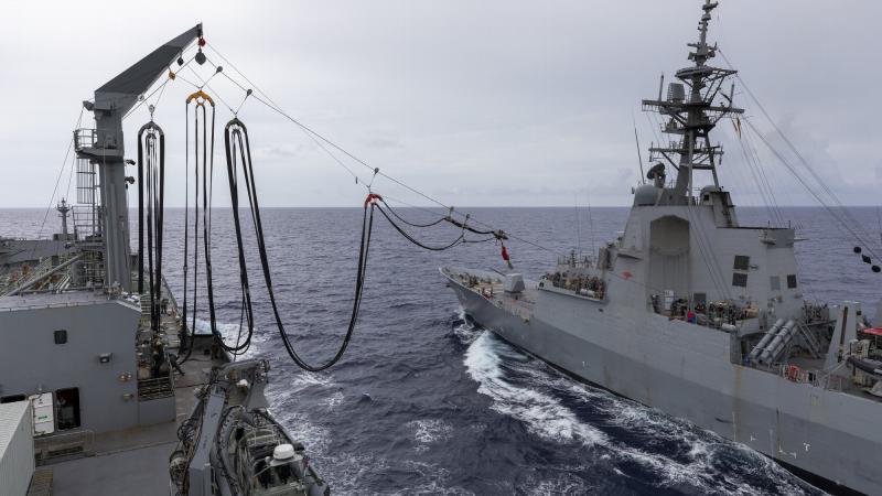HMAS Sirius conducts her 700th replenishment at sea with HMAS Hobart during the Regional Presence Deployment. Photo: Leading Seaman Christopher Szumlanski 