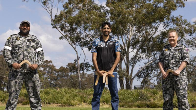 Able Seaman Boatswains Mate Jorde Lenoy, Raymond Timbery and Chief Petty Officer Medic Tina Elliot during a cultural immersion workshop at HMAS Albatross, Nowra. Photo: Chief Petty Officer Cameron Martin