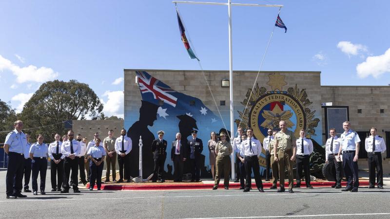 Vice Chief of the Defence Force Vice Admiral David Johnston with AFG’s patron Air Vice Marshall Kym Osley and Officer Commanding AFG Squadron Leader Ben Cowan with members of the AFG at the unveiling. Photo: Corporal Julia Whitwell 