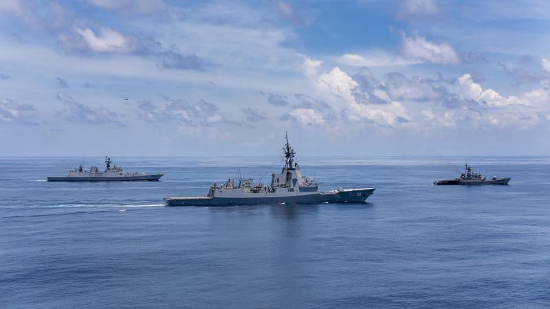 INS Sahyadri, left, HMAS Hobart and INS Karmuk sail in company during a passage exercise in the north-east Indian Ocean. Photo: Leading Seaman Christopher Szumlanski 