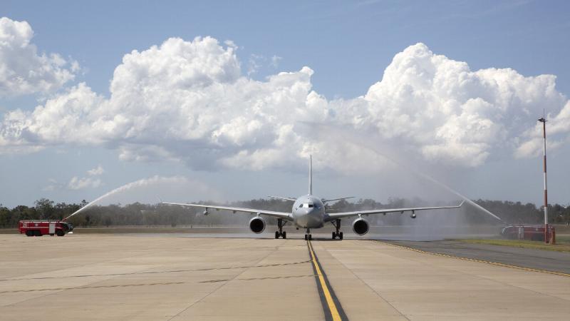  A KC-30A multi-role tanker transporting No. 33 Squadron personnel returning home from the Middle East region, is given a guard of honour by No. 23 Squadron Fire Section on arrival at RAAF Base Amberley. Photo: Corporal Colin Dadd