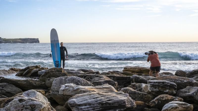 Private Madhur Chitnis captures a portrait of RAN Chief Petty Officer Roger Roy at Maroubra Beach, Sydney. Photo: Sergeant Christopher Dickson