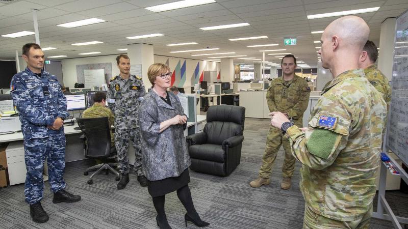 Minister for Defence Linda Reynolds talks with ADF personnel during a visit to the Western Australian State Health Incident Coordination Centre earlier this year. Photo: Petty Officer James Whittle