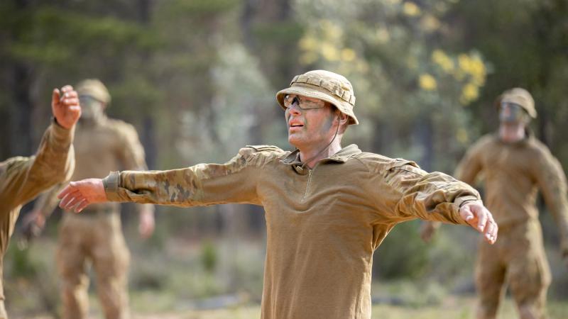 Staff Cadet Nathan Gould conducts star-jumps during a PT session on Exercise Shaggy Ridge at Majura Training Area in Canberra, ACT. Photo: Corporal Robert Whitmore