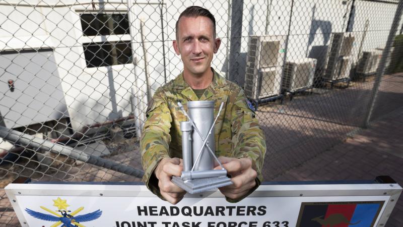 Sergeant Kieran Preston with his silver swab award at the Joint Task Force 633 headquarters in the Middle East . Photo: Corporal Tristan Kennedy 