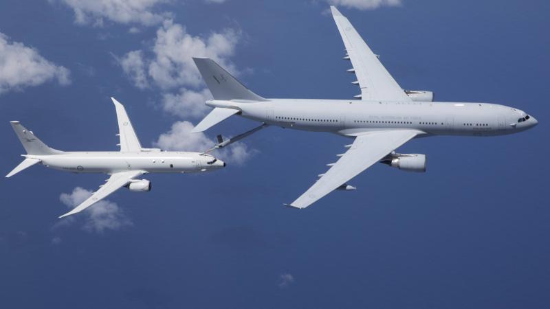 In a first, a RAAF KC-30A refuels a P-8A Poseidon. Photo: Corporal Brett Sherriff