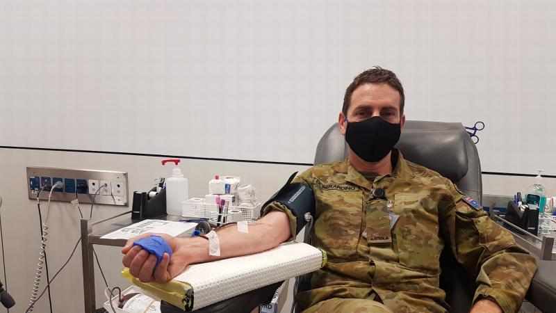 Private Anthony Di Berardino donates blood on behalf of the 4th Brigade in Victoria during the 2020 Defence Blood Challenge.