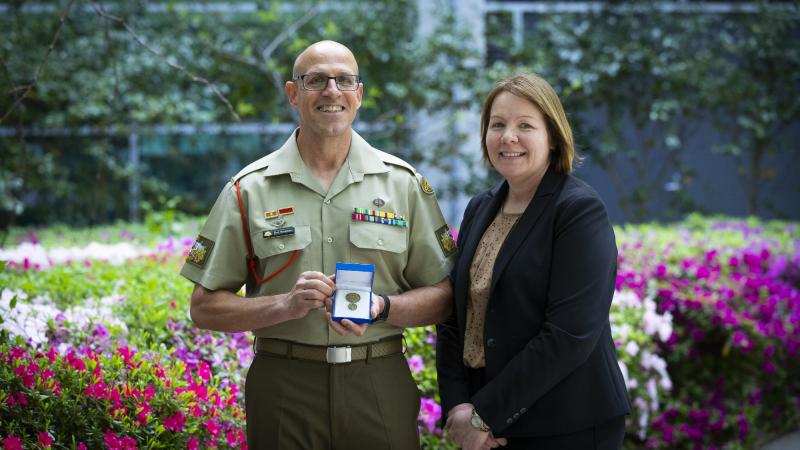 Warrant Officer Class 1 Rod Rootham with his wife Warrant Officer Class 2 Jo Rootham after receiving a Vice Chief of the Defence Force Gold Commendation in Canberra. Photo: Kym Smith