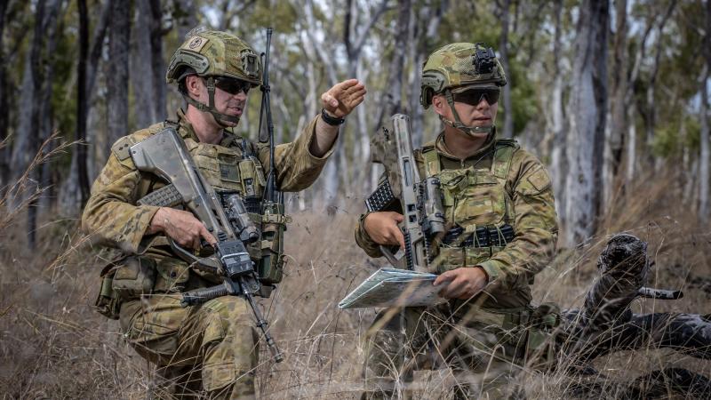 ADF Gap Year officer Lieutenant Gabriel Sohn, right, of 6 RAR, with Lieutenant Samuel Jenner during an exercise at Shoalwater Bay, Queensland. Photo: Trooper Jonathan Goedhart
