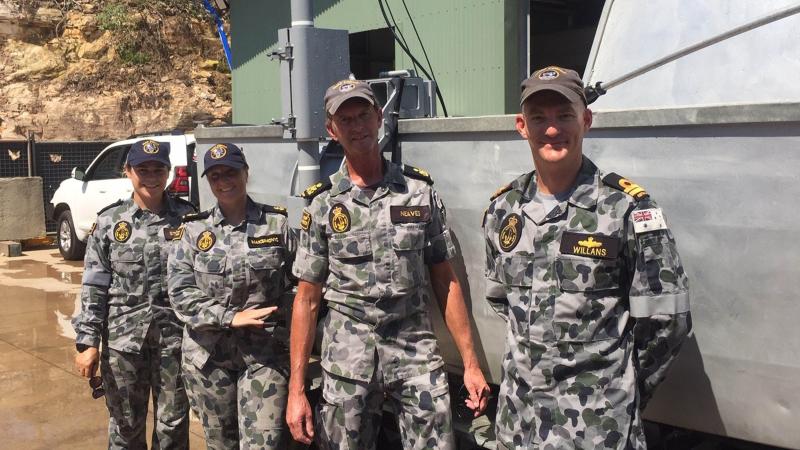 Able Seaman Deneki Stewart, left, Leading Seaman Tanya Maksimovic, Petty Officer David Neaves and Lieutenant Jared Willans with the fly-away survey equipment used to find a submerged watering hole.