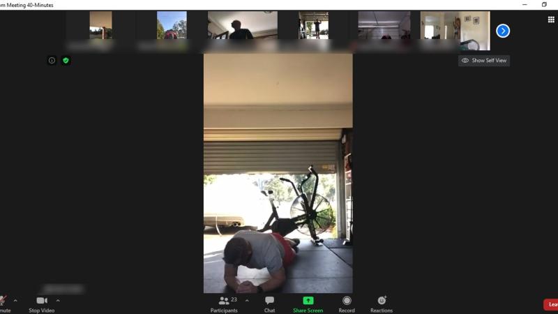 Corporal Matt Siddle takes participants through a physical training session on Zoom.