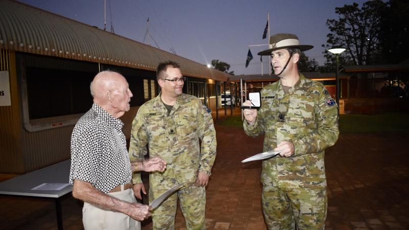 Former leading aircraftman Phil Robinson with Norforce Kimberley Squadron’s Major Matthew Jones and Warrant Officer Class 2 Christopher O’Sullivan.