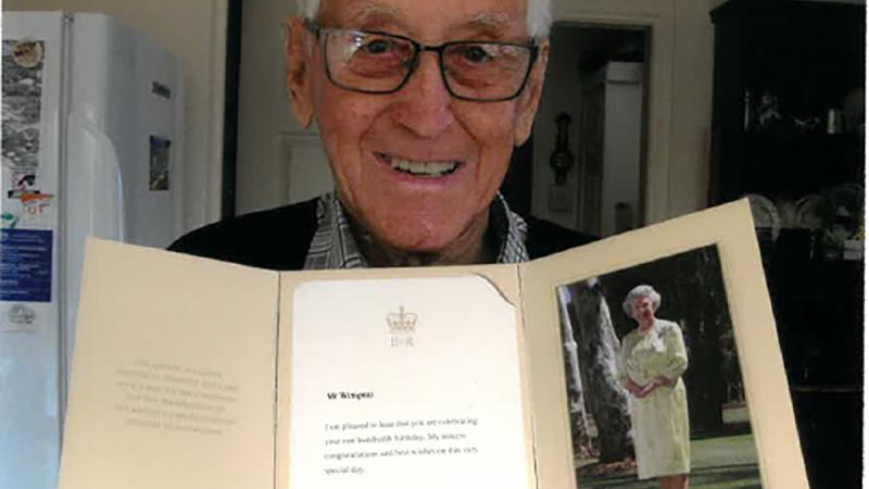Flight Lieutenant Roger Winspear (retd) with the letter he received from the Queen to mark his 100th birthday.