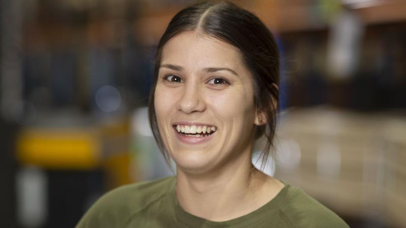 Private Myah Peters in the warehouse of the ADF's main operating base in the Middle East, Camp Baird. Photo: Corporal Tristan Kennedy 