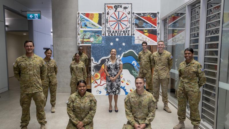Aunty Lorraine Hatton, centre, with members of the 3rd Combat Service Support Battalion during her visit to 3rd Brigade, Lavarack Barracks, Townsville. Photo: Lily Charles