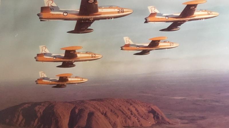 Wing Commander Ron Biddell (retd) organised for the Roulettes aerobatic team to be photographed flying over Uluru at sunset on June 7, 1977.