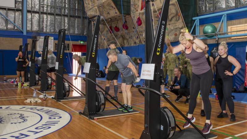Participants in a fundraising marathon for Soldier On hit the ski trainers at the HMAS Kuttabul gym. Photo: Aircraftwoman Emma Schwenke