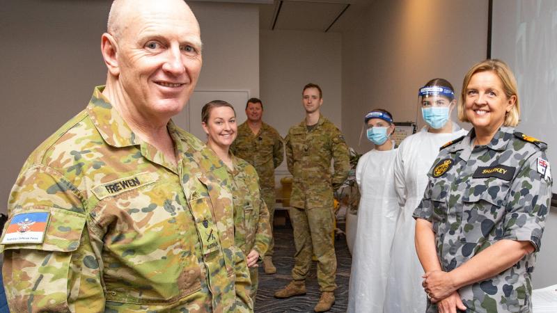 Lieutenant General John Frewen and Rear Admiral Sarah Sharkey, right, with members of the Task Element ADF hotels during their visit to a quarantine hotel in Brisbane. Photo: Corporal Jesse Kane