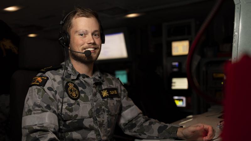 Leading Seaman Combat Systems Operator Aircraft Controller Lachlan Dukes in the operations room on board HMAS Arunta during Operation Argos. Photo: Leading Seaman Jarrod Mulvihill 