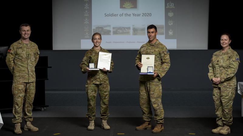 Major General Matt Pearse, left, and Warrant Officer Class 1 Kim Felmingham, rar right, with Forces Command Soldier of the Year winners Lance Bombardier Lauren Kreis, second from left, and Lance Corporal David Zammit. Photo: Corporal Sagi Biderman
