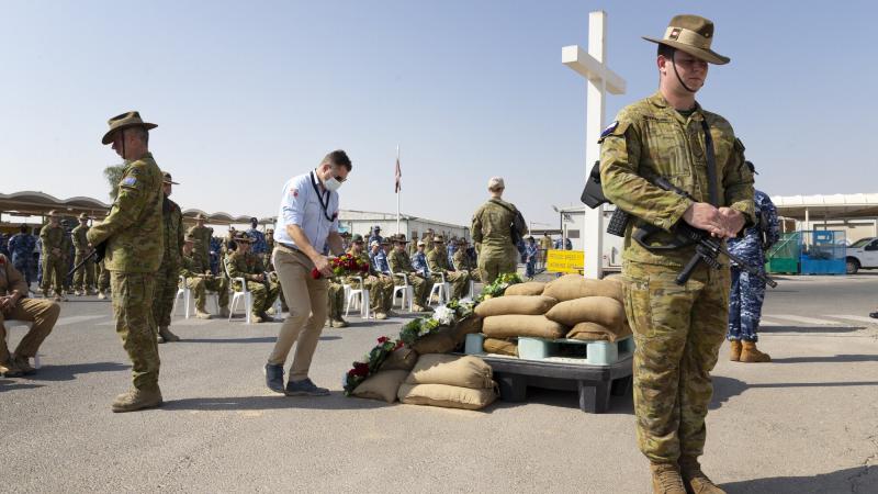 Personnel from Australia’s main operating base in the Middle East region hold a Remembrance Day service. Photo: Corporal Tristan Kennedy