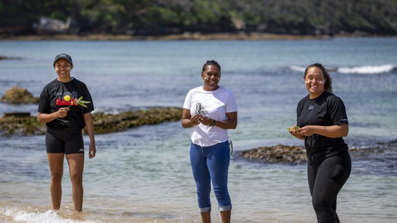 Able Seaman Boatswains Mates Jahlaya Weazel, Vanessa Lee Cheu and Kirsten Taylor Hansson on the tour at La Perouse, NSW. Photo: Leading Seaman Thomas Sawtell