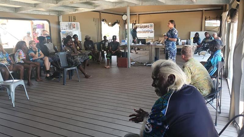 Indigenous liaison officer Pilot Officer Gabrielle Read speaks with Bush Uni students at Wuyagabi, Northern Territory.