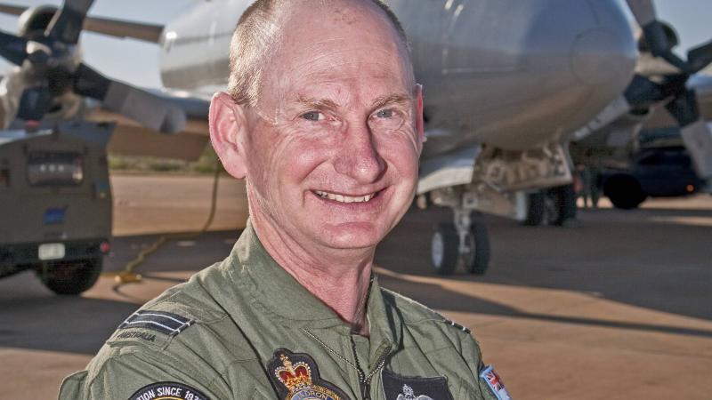 Then Flight Lieutenant Greg Toft with an AP-3C Orion. He recently captained his final flight in a P-8A Poseidon at RAAF Base Edinburgh. Photo: Leading Aircraftman Glynn Jones