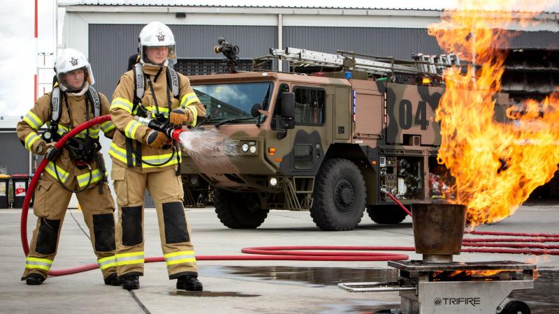 Aircraftwoman Baylee Smith experiences a day in the life of a RAAF firefighter at RAAF Base Amberley. Photo: Corporal Jessica de Rouw