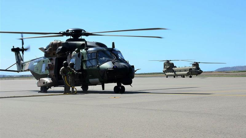 Soldiers from the 5th Aviation Regiment conduct start checks on an MRH-90 during Exercise Vigilant Scimitar. Photo: Ken Wilson