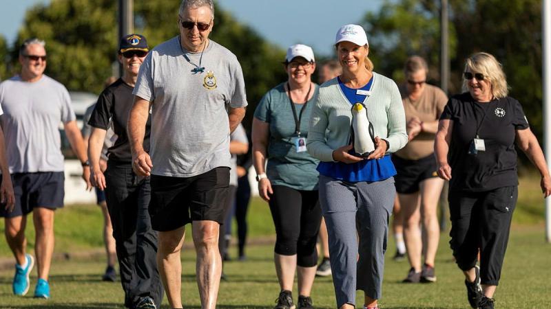 Navy personnel and community members step out in support of the Say No to Domestic Violence Walk in Sydney.