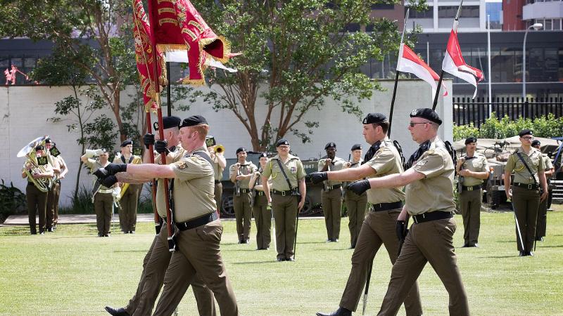 Soldiers from the 1st/15th Royal New South Wales Lancers march on the guidons during the Lancer Barracks bicentennial parade at Parramatta. Photo: Petty Officer Andrew Dakin