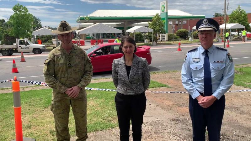 Brigadier Michael Garraway with NSW Premier Gladys Berejiklian and NSW Police Commissioner Michael Fuller in front of the Wodonga Place border checkpoint in Albury.