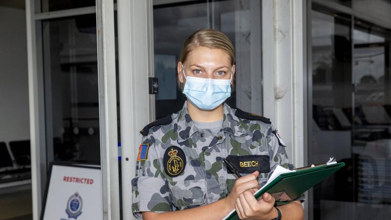 Able Seaman Maritime Logistics Support Operations Britney Beech at Sydney Airport during Operation COVID-19 Assist. Photo: Leading Seaman Nadav Harel