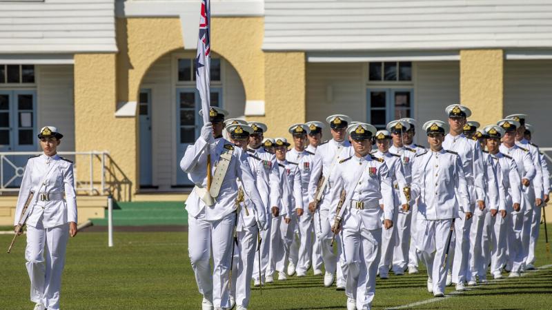 The guard marches onto the parade ground at HMAS Creswell in Jervis Bay during the New Entry Officers Course 63 graduation ceremony. Photo: Chief Petty Officer Cameron Martin