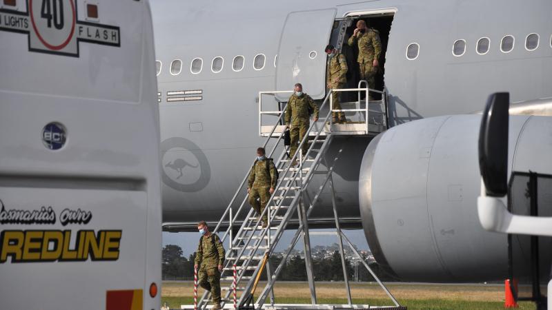 ADF personnel from Queensland arrive in Tasmania on board a Royal Australian Air Force KC-30 aircraft in support of Operation COVID-19 Assist.