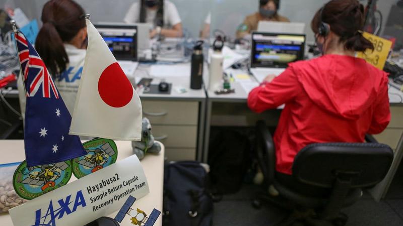 Members from the Japan Aerospace Exploration Agency monitor the Hayabusa2 capsule within the range support facility at the Woomera Test Range. Photo: Corporal Brenton Kwaterski