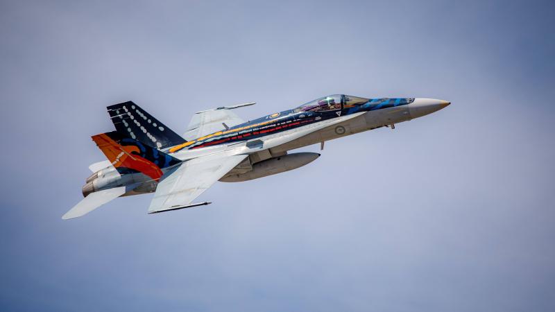 The F/A-18A Worimi Hornet conducts a handling display on its final flight at RAAF Base Williamtown. Corporal Craig Barrett