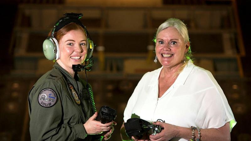 One of the Air Force's newest C-130J Hercules aircraft loadmasters, Corporal Jordyn Luck, is joined by the first-ever female loadmaster, Mrs Katrina Salvesen on board a 130J Hercules at RAAF Base Richmond. Photo: Corporal David Said