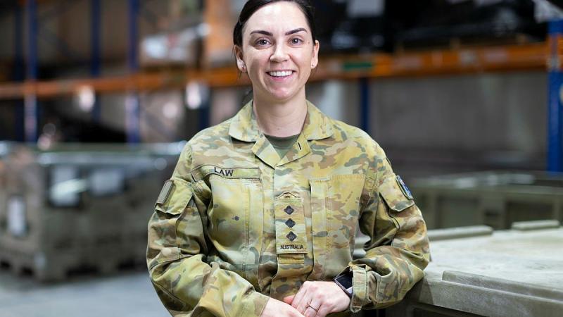 Captain Jess Law in the warehouse of the ADF’s main operating base in the Middle East region. Photo: Corporal Tristan Kennedy