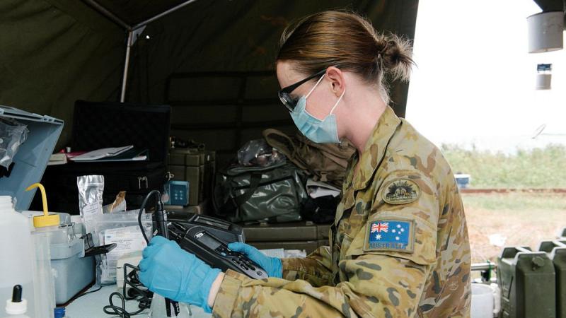 Captain Nicole Eltringham tests water from a desalination system in Vanua Levu on Operation Fiji Assist. Photo: Lieutenant Phillip Qin 
