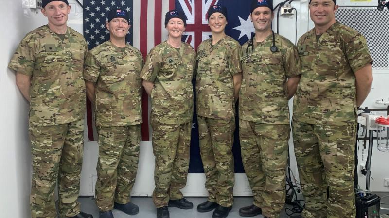 The ADF medical team embedded in Iraq’s Baghdad Diplomatic Support Centre, Afghanistan, Major Paul Smith, left, Captain Ian Young Lieutenant Commander Anna Kane, Captain Rachel Gillies, Major Adam Mahoney and Major Kyle Bender.