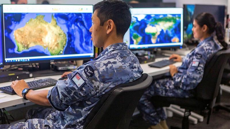 Corporal Yasunari Fujimura and Aircraftwoman Amandeep Kaur, from Distributed Ground Station – Australia, prepare for last year’s Exercise Coalition Virtual Flag. DGS-AUS is now No. 83 Squadron. Photo: Leading Aircraftwoman Jacqueline Forrester
