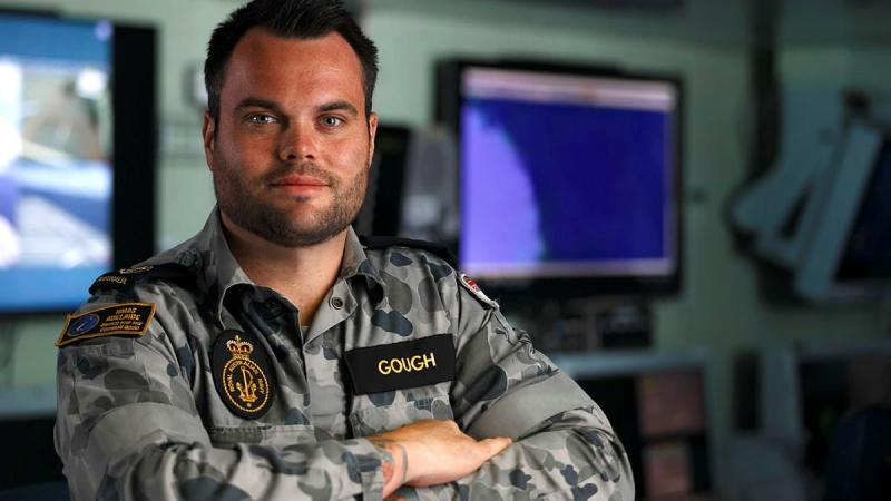 Former apprentice carpenter Leading Seaman Leigh Gough deployed in HMAS Adelaide on Operation Fiji Assist 20-21. Photo: Dustin Anderson