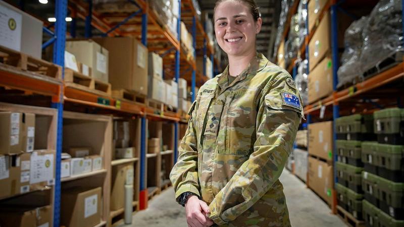 Lieutenant Madeline Meagher at the warehouse facility in the Middle East region. Photo: Sergeant Ben Dempster