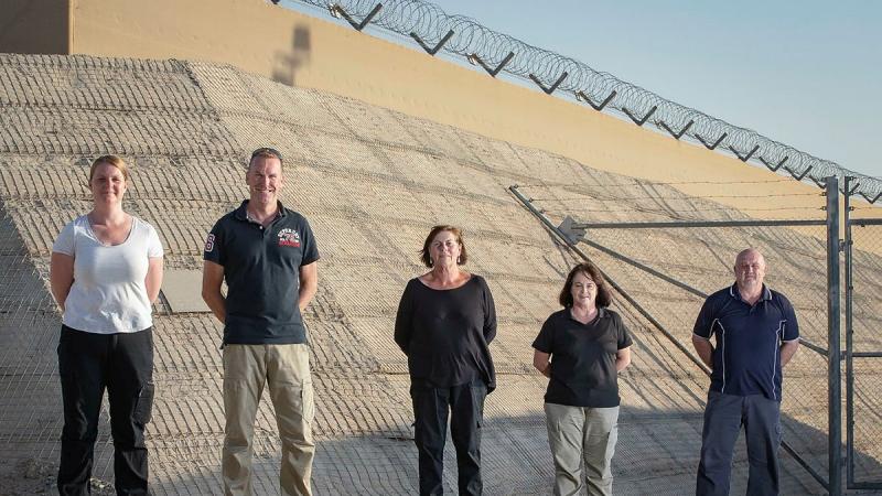 Ros Radburn, left, Glen Bouwman, Carmel Ryan, Jacqui Stuart and Luke Collison on Operation Accordion in the Middle East region. Photo: Sergeant Ben Dempster