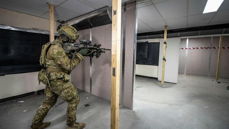 Private Jake Hopkins of 8th/9th Battalion, Royal Australian Regiment, during testing of a new urban training facility at Greenbank training area, Queensland. Photo: Private Jacob Hilton