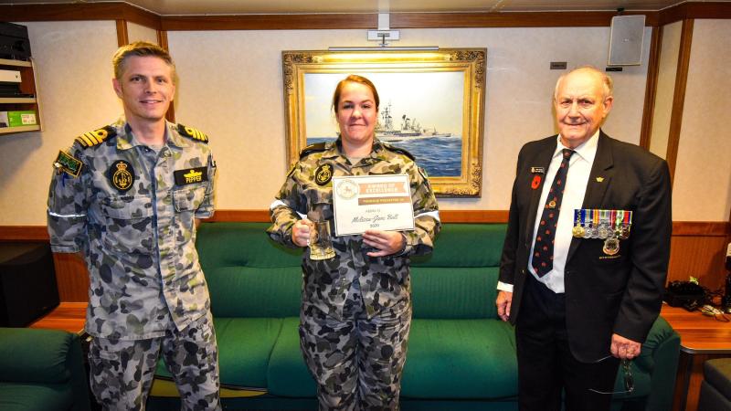 Commander Andrew Pepper with Able Seaman Melissa-Jane Bult and John Withers on board HMAS Hobart. Photo: Petty Officer Brendan Matchett